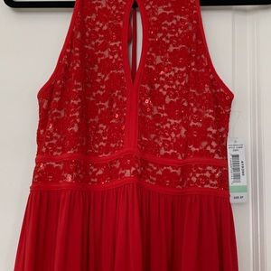 Stunning red party dress, New with tags never worn.